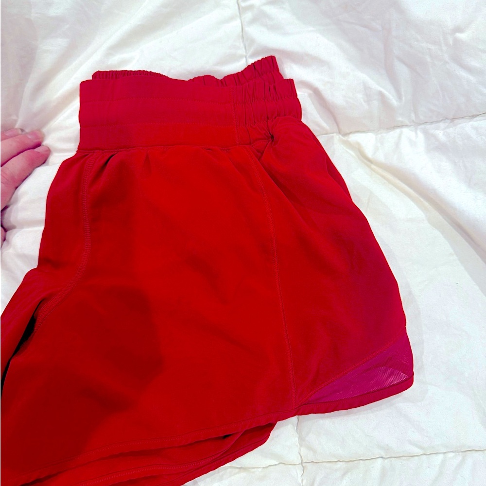 Red Lululemon running shorts